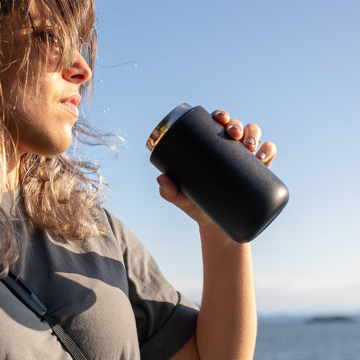 Lifestyle image of matte black move mug